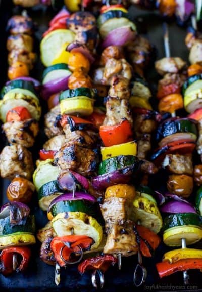 balsamic grilled chicken kabobs on a baking sheet