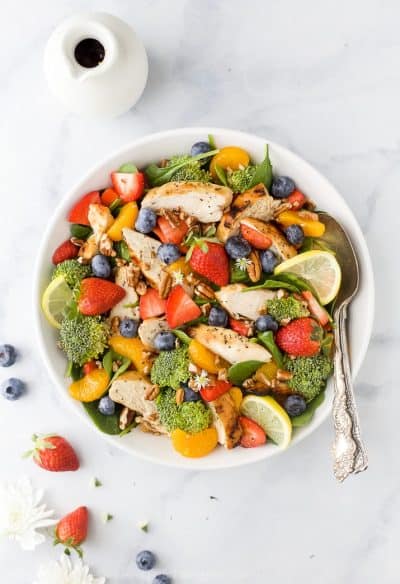 detox strawberry chicken salad with honey mustard dressing in a bowl