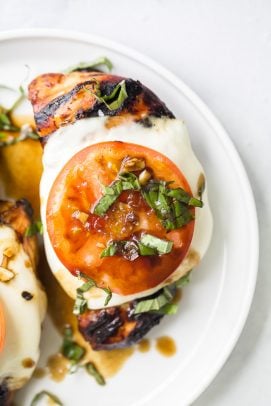 overhead photo of easy grilled balsamic caprese chicken on a plate