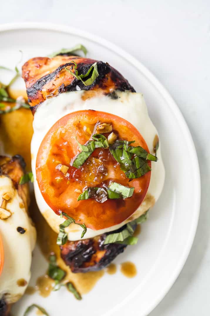 overhead photo of easy grilled balsamic caprese chicken on a plate