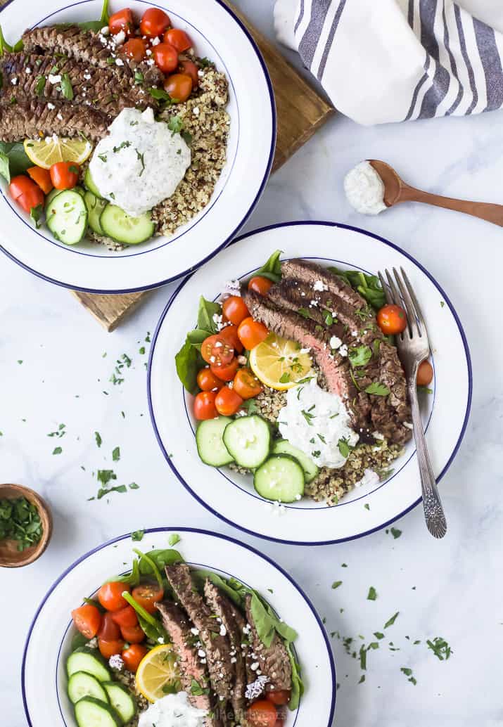 three bowls of easy mediterranean steak and quinoa bowl