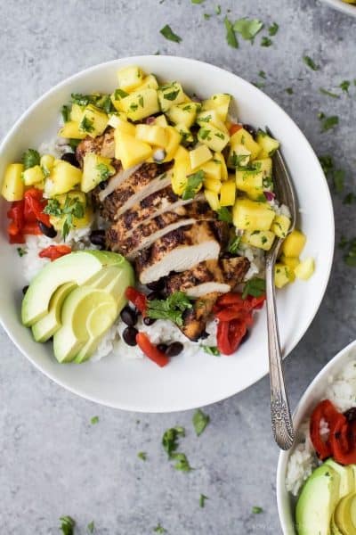 jerk chicken bowls with mango pineapple salsa in a bowl