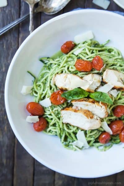 pesto chicken zoodles with grilled chicken and burst tomatoes
