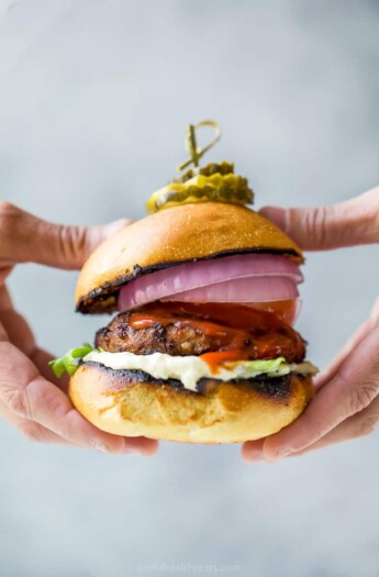 ultimate classic turkey burger being held with hands