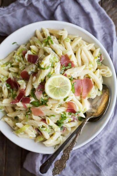 creamy lemon pasta with prosciutto in a bowl