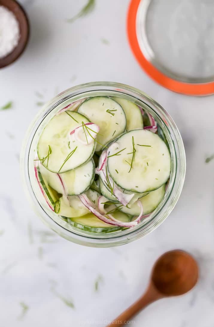 overhead photo of 10 minute creamy cucumber salad in a jar