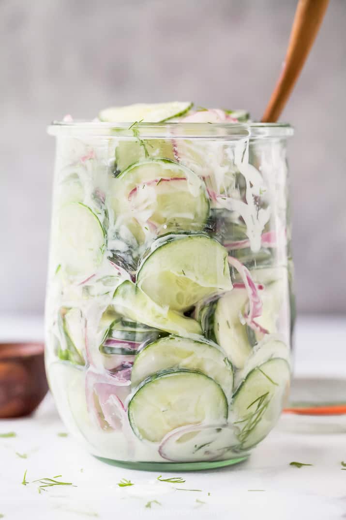 close up photo of 10 minute creamy cucumber salad in a jar