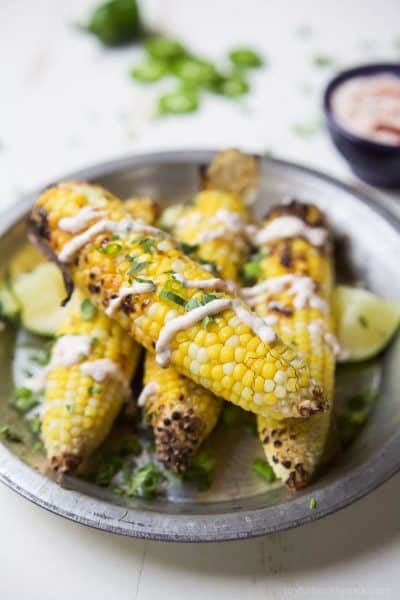 grilled corn on the cob topped with creamy roasted jalapeno sauce