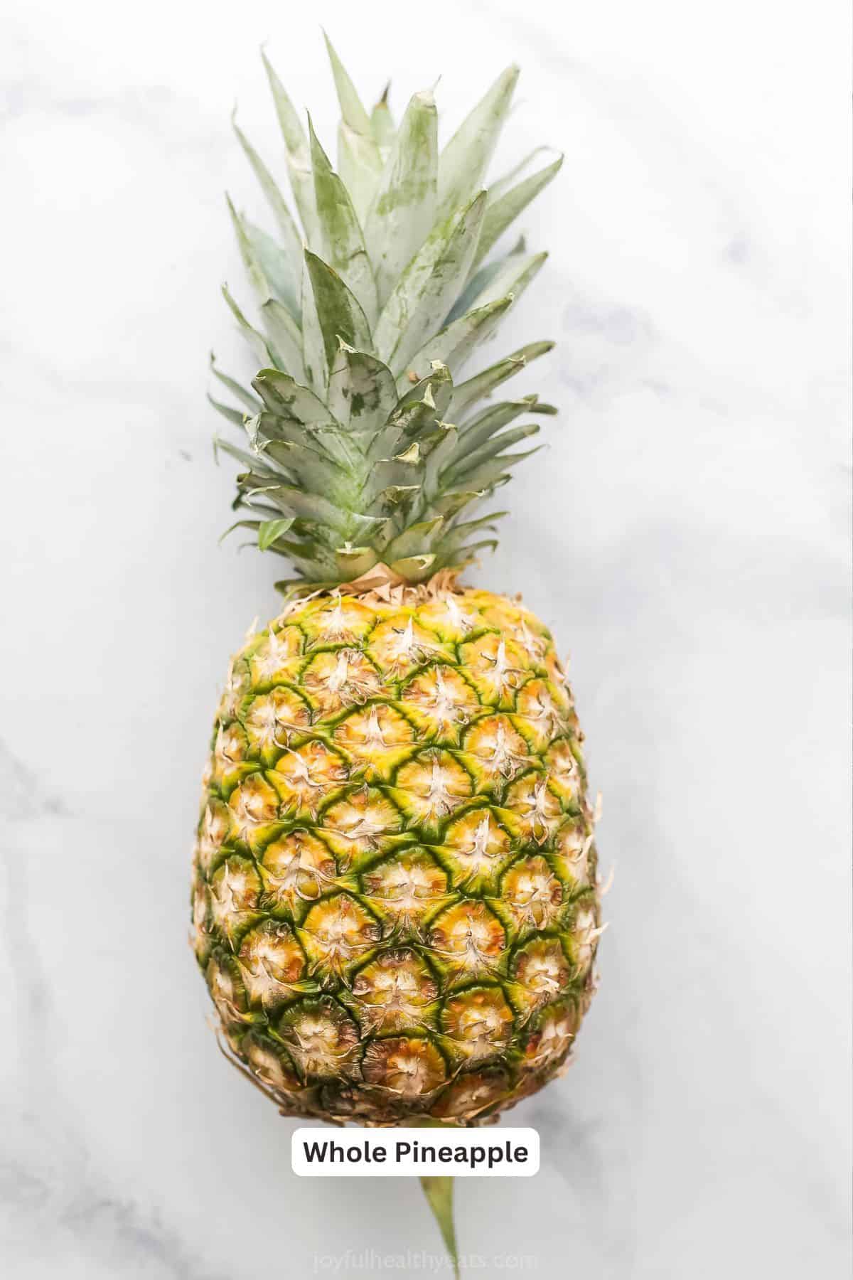 Juicy Grilled Pineapple is the easiest summer dessert and also the tastiest! Serve it as-is or fancy it up with a scoop of ice cream. Overhead view of grilled pineapple ingredients