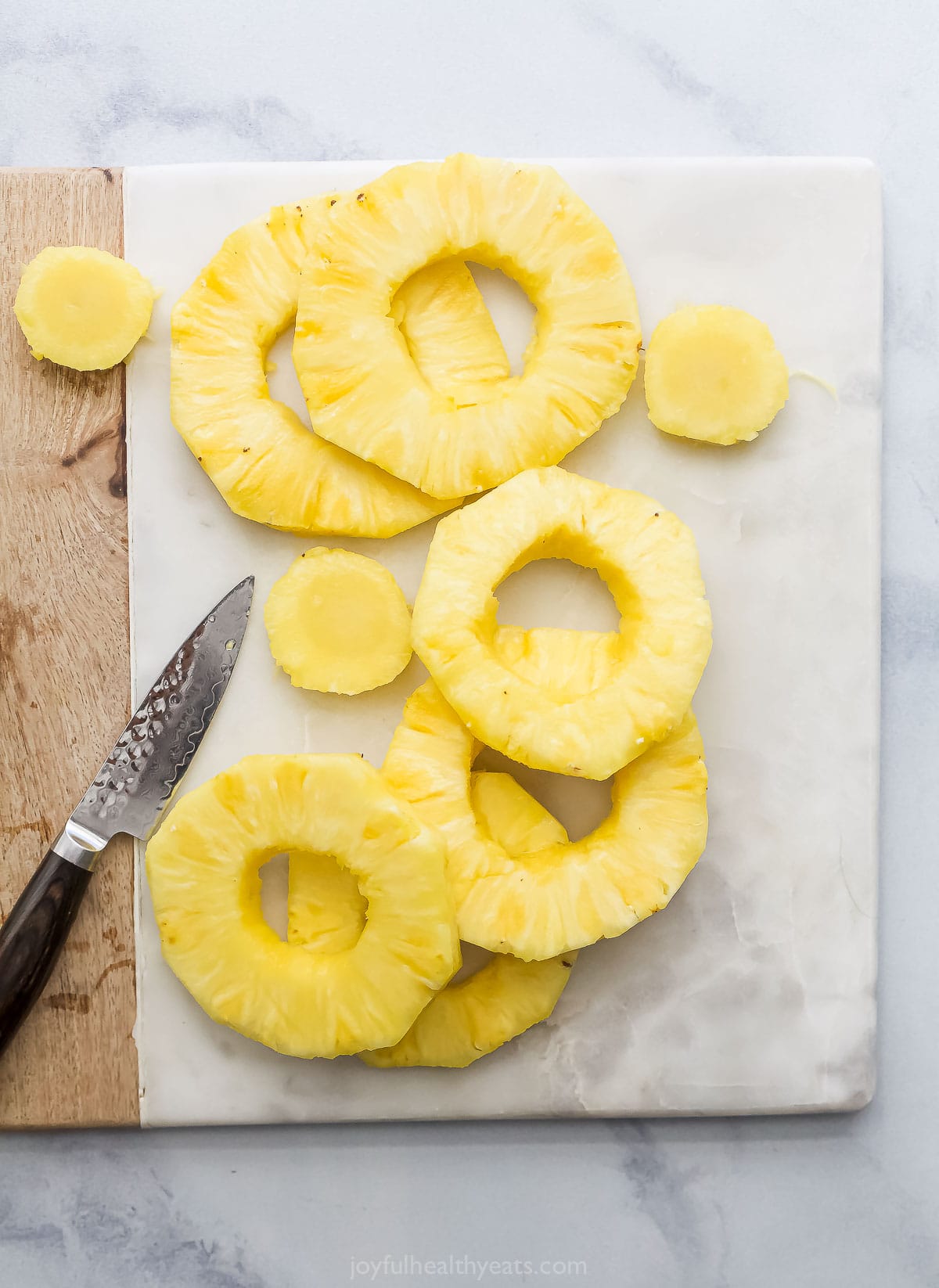Overhead view of sliced pineapple rings