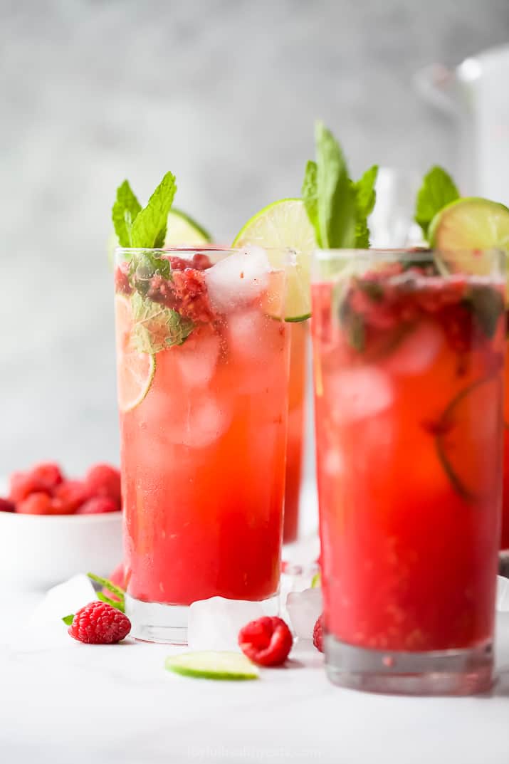 photo of the best fresh raspberry mojito recipe in a glass