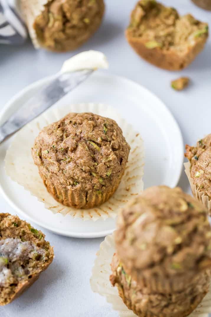 easy moist healthy zucchini muffins on a plate