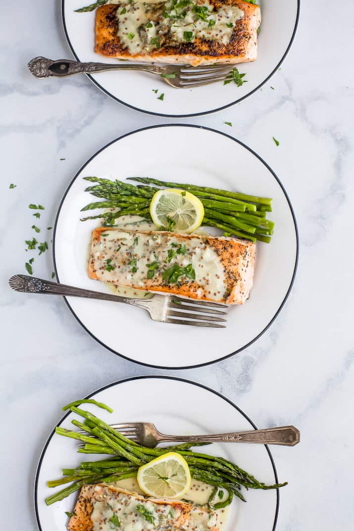 pan seared salmon on a plate with asparagus