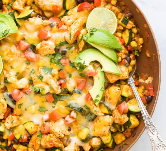 overhead photo of 30 minute zucchini chicken enchilada skillet in a pan