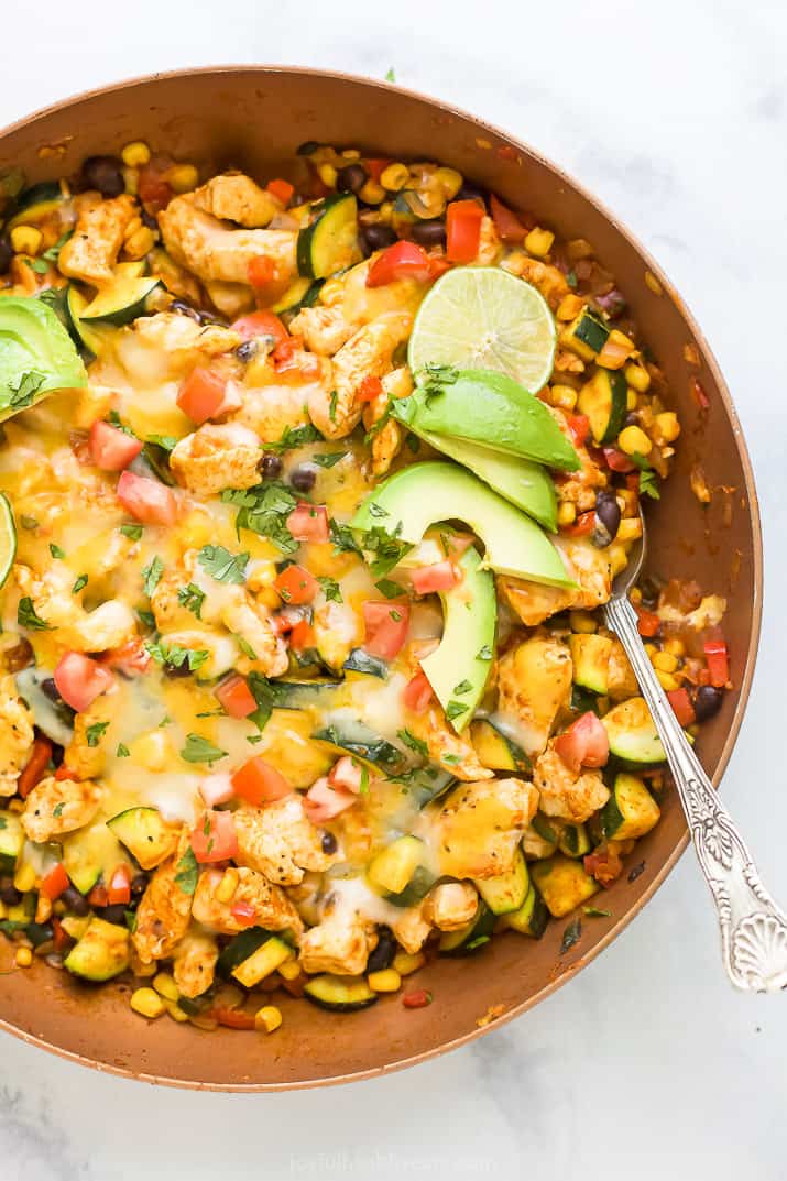 overhead photo of 30 minute zucchini chicken enchilada skillet in a pan