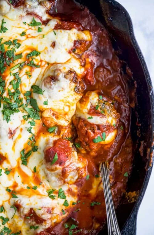 cheesy keto turkey meatballs baked in marinara with cauliflower puree