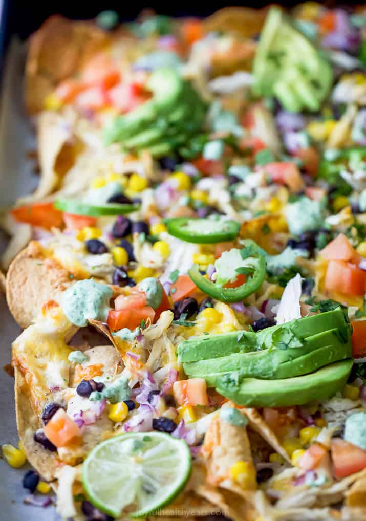 side photo of easy 20 minute sheet pan chicken nachos