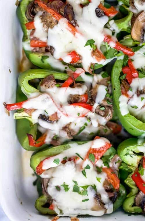 easy keto philly cheesesteak stuffed peppers in a baking dish