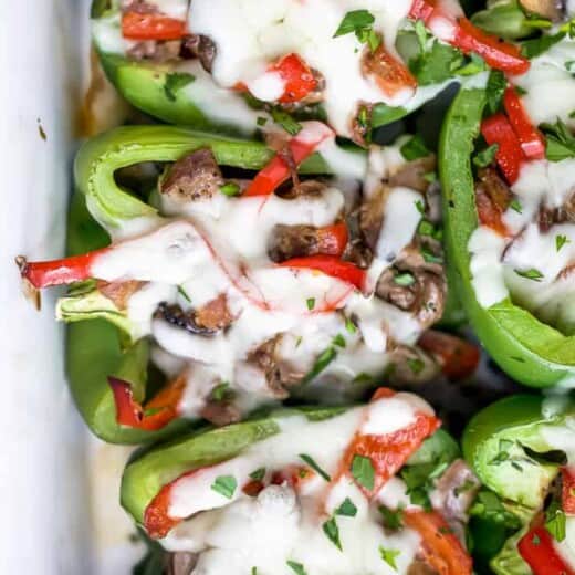 easy keto philly cheesesteak stuffed peppers in a baking dish