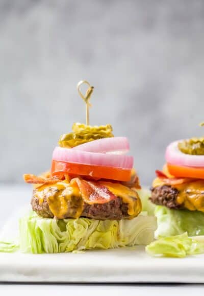 perfect keto bacon cheeseburger topped with burger fixings