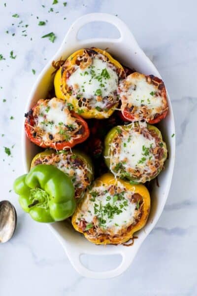 turkey bolognese stuffed peppers on baking dish