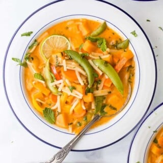 Thai noodle soup in a bowl with spoon.