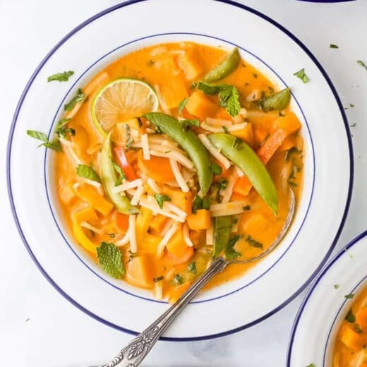 overhead photo of 30 minute vegetable thai noodle soup in a bowl