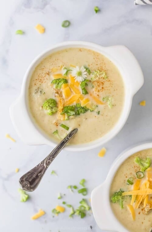 overhead photo of a bowl filled with broccoli cheese soup