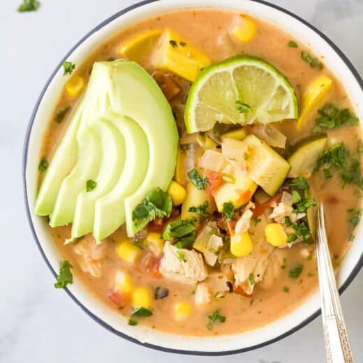 close up photo of the ultimate creamy crockpot chicken tortilla soup