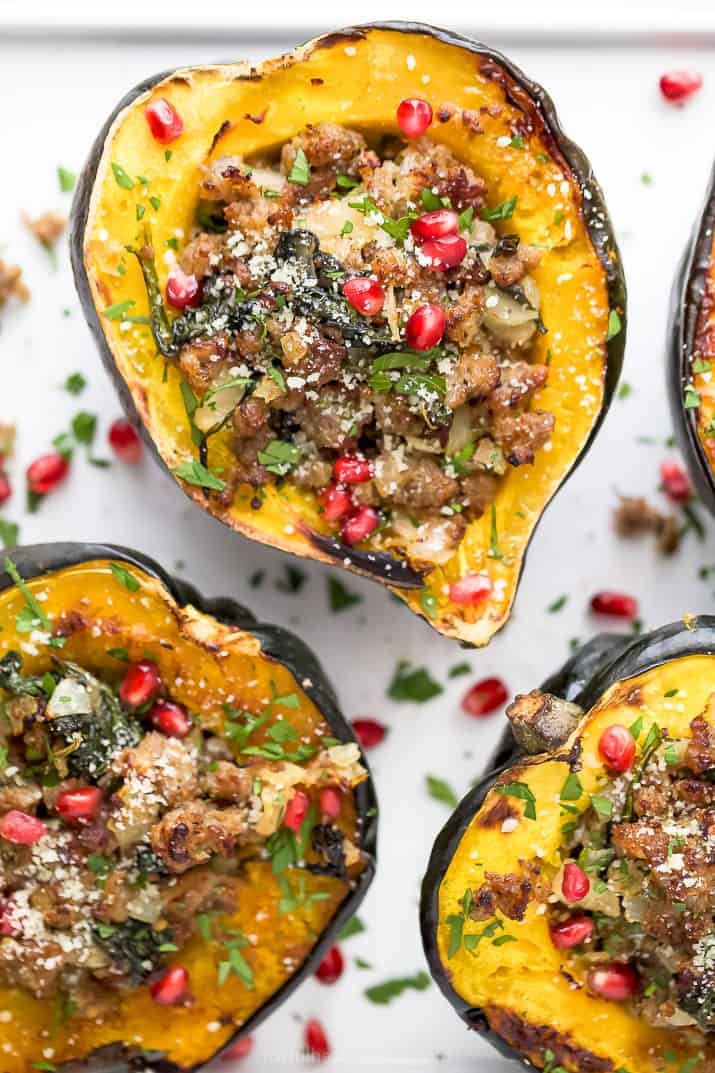 close up photo of apple sausage stuffed acorn squash