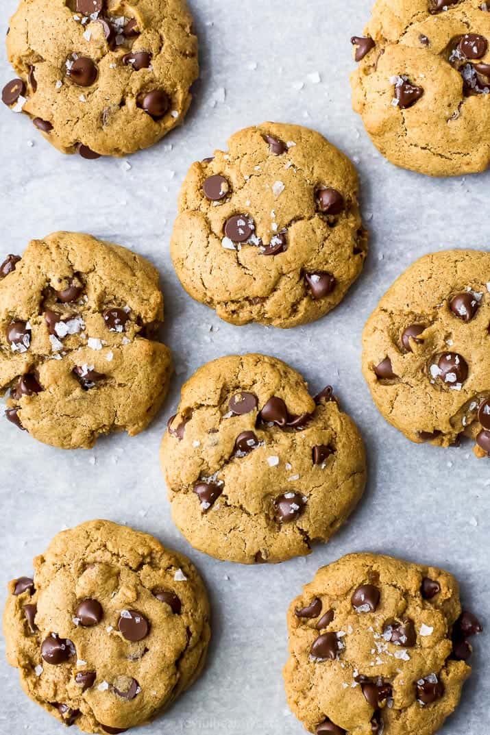 overhead photo of freshly baked vegan pumpkin chocolate chip cookies