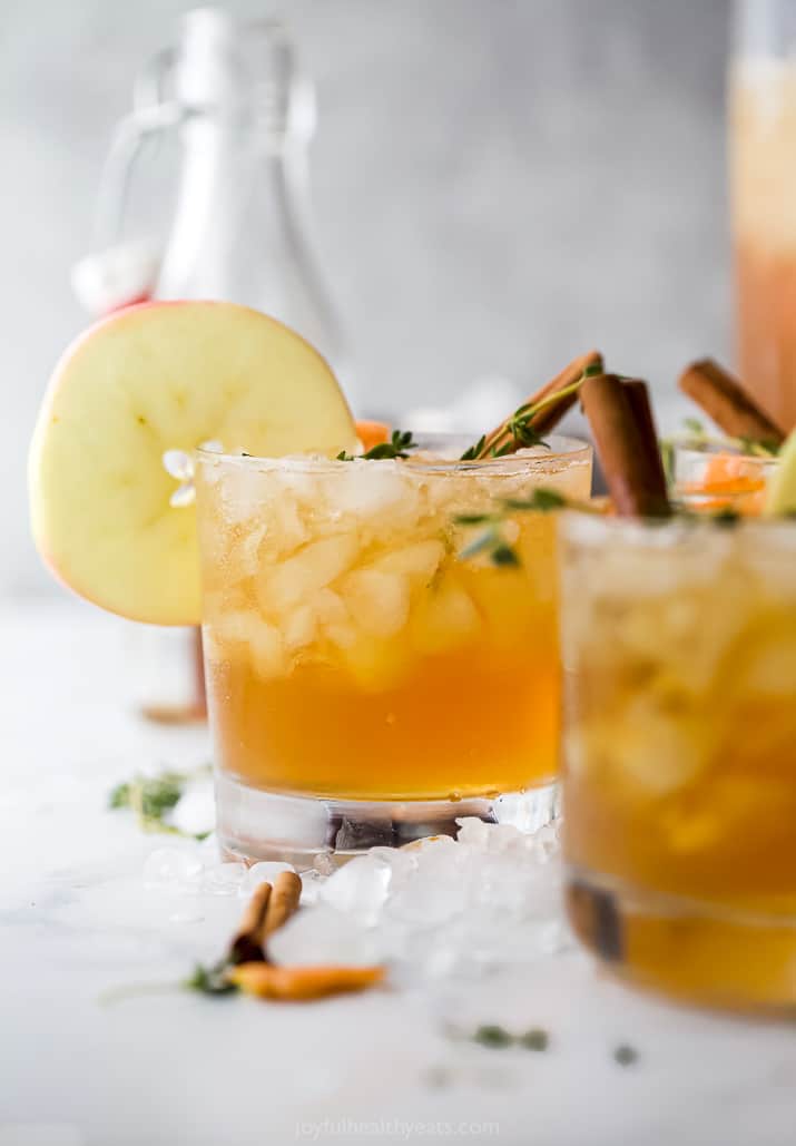 harvest apple bourbon cocktail in a glass with cinnamon stick