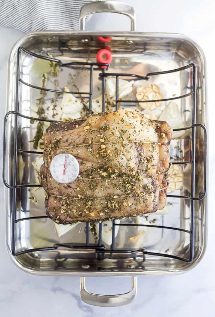 Meat thermometer in prime rib roast.