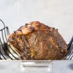 perfect garlic herb prime rib roast in a roasting pan