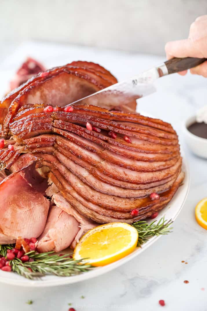 close up photo of easy pomegranate maple glazed ham recipe