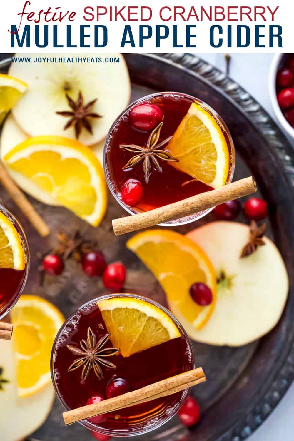 pinterest image for festive spiked cranberry mulled apple cider