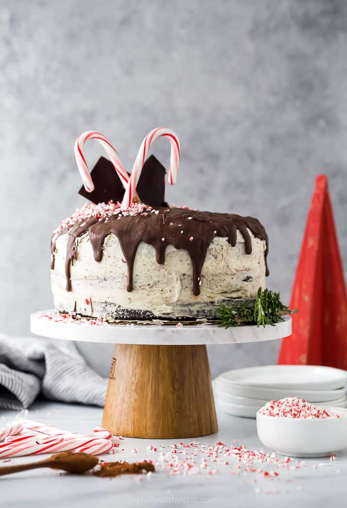 vegan chocolate cake with peppermint buttercream on a cake stand