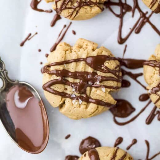 vegan peanut butter cookies with a chocolate drizzle