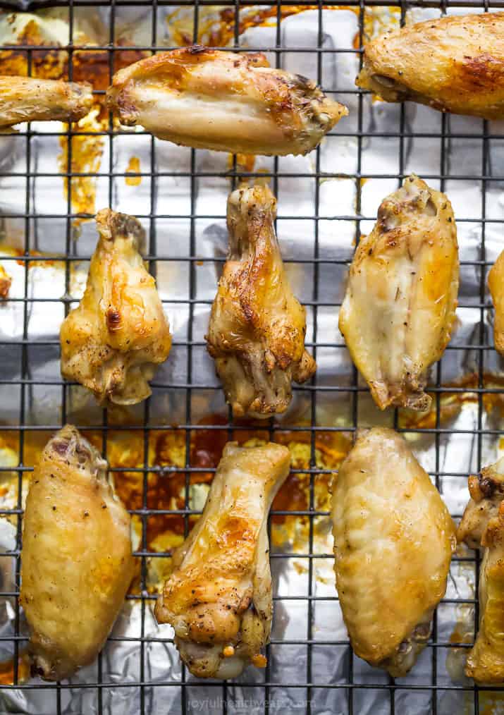 overhead photo of baked chicken wings on a baking sheet