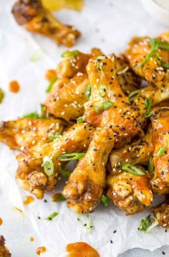 crispy baked korean bbq chicken wings with sesame seed and green onions