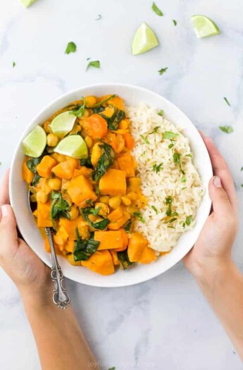 vegan sweet potato chickpea curry with rice in a bowl