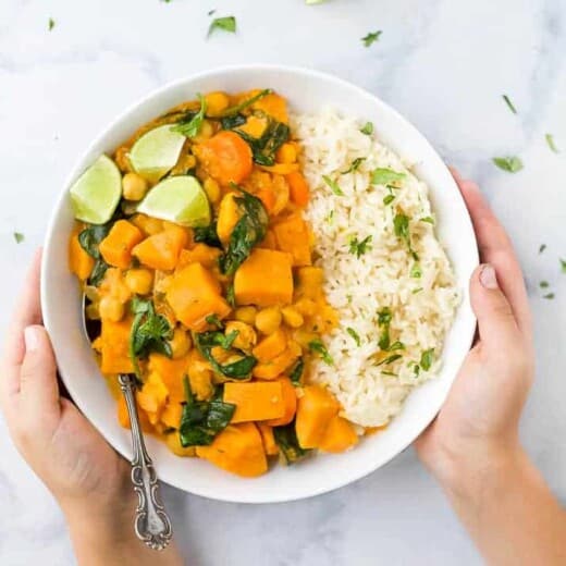 vegan sweet potato chickpea curry with rice in a bowl