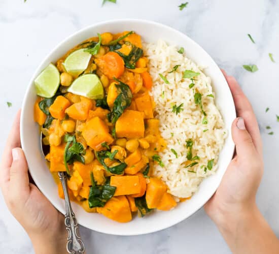 vegan sweet potato chickpea curry with rice in a bowl