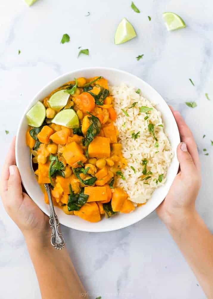 vegan sweet potato chickpea curry with rice in a bowl