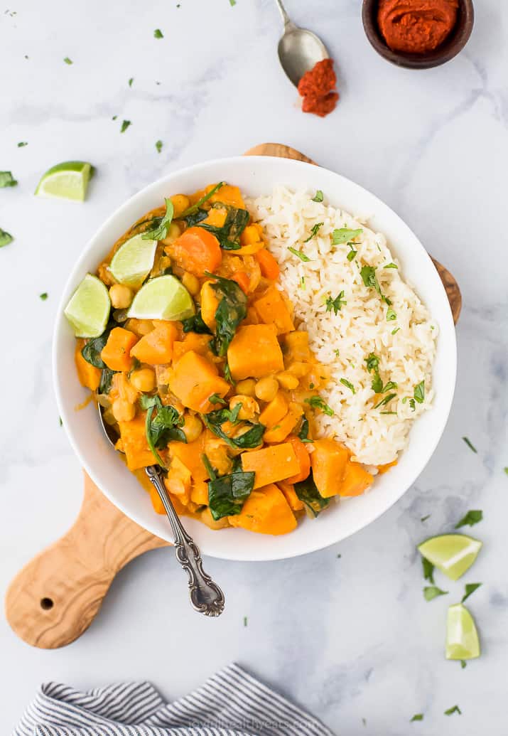 easy vegan sweet potato chickpea curry with rice in a bowl