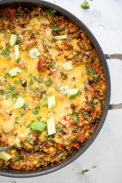 overhead photo of healthy one pan cheesy quinoa taco skillet