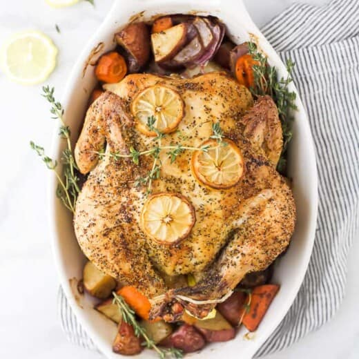 easy roasted chicken with vegetables in a baking dish