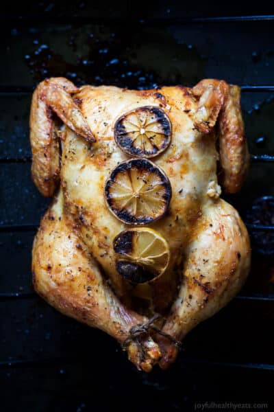 overhead photo of oven roasted chicken with garlic lemon butter sauce