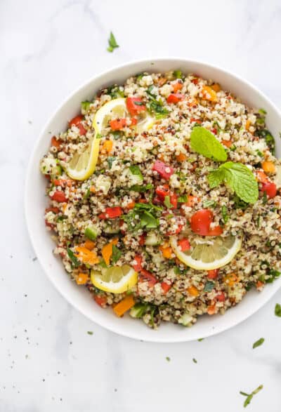 a bowl filled with refreshing tabbouleh quinoa salad