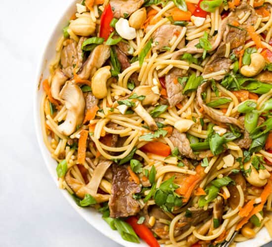overhead photo of easy kung pao beef noodles in a bowl